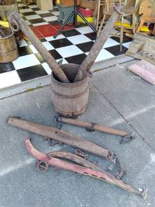 vintage tub full of farm implementa...