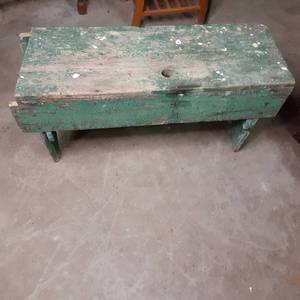 Green painted wood vintage bench. A...