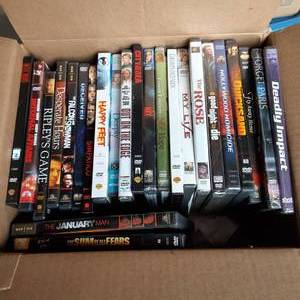 Box with a wide variety of DVD movi...
