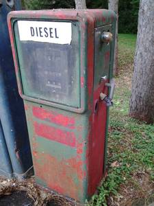 Antique Heavy Duty Metal Short Gas pump Approximate measurements 20.5x57x17.5  functionality is unknown