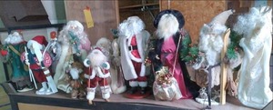 4 boxes of tree topper Santas and ...