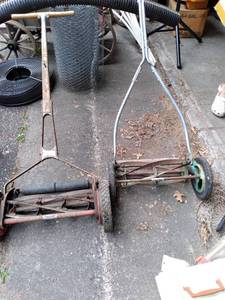 2 vintage push mowers...