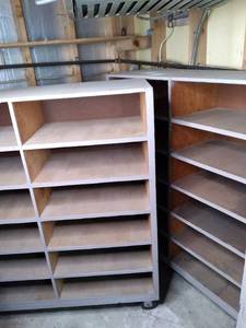 (2) 12 Shelf Storage cabinet on whe...