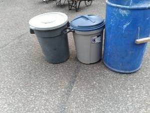 (4) Garbage Cans, three have lids...