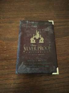lot 49 image: Silver Proof Limited Edition Mickey Mouse Coin