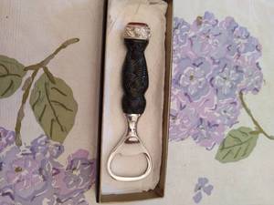 lot 217 image: Bottle Opener & Lace