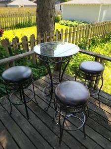 lot 126 image: High top glass top table with 4 patio tables