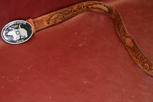 lot 43 image: engraved belt devoted to fishing