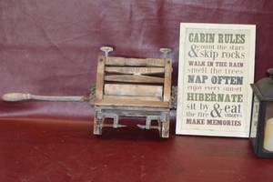 lot 45 image: Anchor clothes wringer and decor