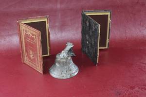 lot 58 image: Metal Bell and hiding books