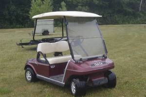 lot 2 image: Club car golf cart and charger
