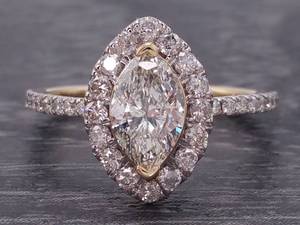 lot 4 image: Spectacular 1.25 Carat Marquise Halo Diamond Ring in 14k Gold