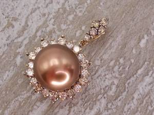 lot 7 image: LeVian Signed Chocolate and White Diamond Pendant With Large Golden Pearl in 14k Gold