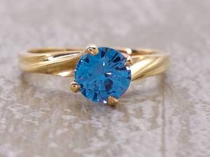 lot 50 image: Beautiful Sea Blue Gemstone Solitaire Gold Ring