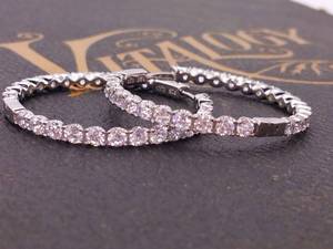 lot 55 image: Sparkling Medium Sized Hinged Hoop Earrings