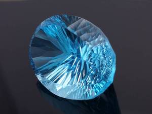 lot 10C image: 45.88 Carat Fancy Cut Starburst  Concave Natural Swiss Blue Topaz