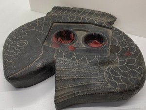 lot 198 image: Stone Fish Shaped Candle Holder