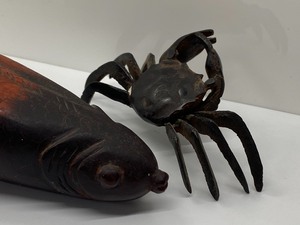 lot 235 image: Carved Bone Koi and Small Brass Crab