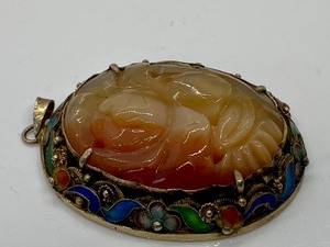 lot 299 image: Carved Pendant with Silver and Enamel Detailing