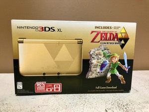 lot 1 image: Nintendo 3DS XL - Zelda A Link Between Worlds Limited Edition Console