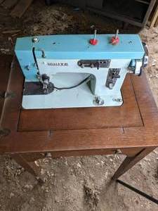 lot 309 image: Antique White Sewing Machine Table with Manual