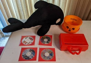 lot 51 image: Vintage McDonalds Red Happy Meal Lunch Pencil Box Plastic 1988, Cloud 9 Orca, McDonalds McBoo Pumpkin pail , (4) General Mills Kids DVDs
