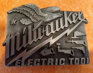 lot 27 image: VTG Milwaukee Electric Tool Company Belt Buckle & VTG GE Edge Watt Miser II 35 Brass Belt Buckle