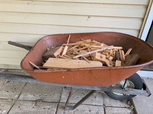 lot 329 image: Metal Wheelbarrow Filled with Scrap Wood