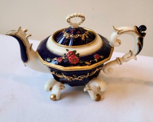 lot 53 image: Tiny Teapots