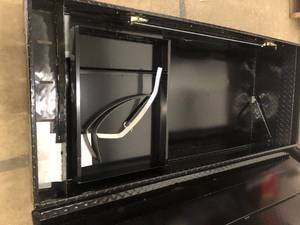 lot 22 image: 70 in Gloss Black Aluminum Full Size Crossbed Truck Tool Box by Lund- damaged  -see pictures