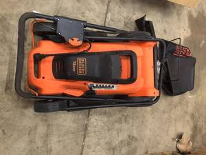 lot 52 image: Black and Decker Lawmower electric see pictures open box