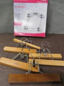 lot 40 image: NEW PREMIUM SCALE.  PANTS HANGERS