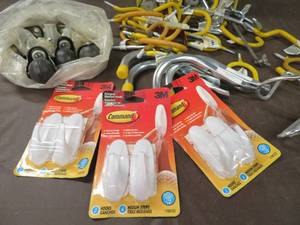 lot 42 image: ASSORTMENT OF HOOKS AND CASTORS