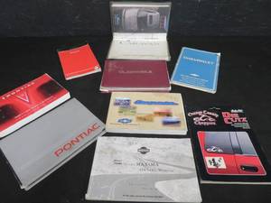 lot 25 image: ASSORTED CAR MANUALS