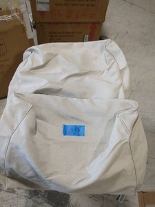lot 109 image: HAMPTON BAY Woodbury CushionGuard Putty Patio Ottoman Slipcover (2-Pack)