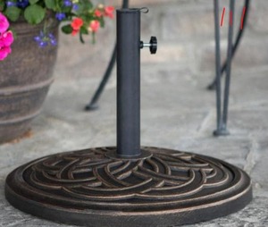 lot 111 image: Circle Weave Round Metal Patio Umbrella Base in Antique Bronze