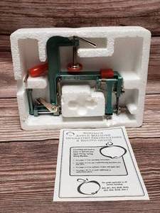 lot 77 image: Apple Corer, Ice Cream Scoop, Serrater & Meat tenderizer