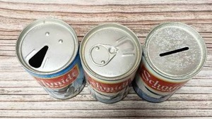 lot 24 image: Old Schmidt Pull Tab Beer Cans and a Piggy Bank