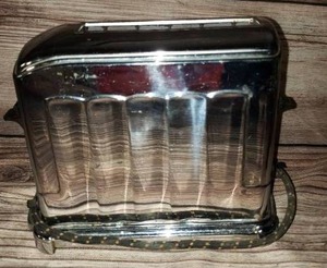 lot 108 image: Vintage (Toasters, Butter Mold, Cheese Slicer, Bread Knife)