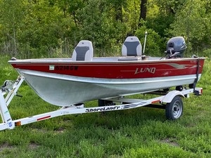 lot 2 image: 2006 Lund Boat, Motor & Trailer