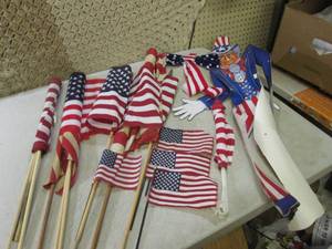 lot 11 image: (EW2) Assorted Sized US Flags on St...