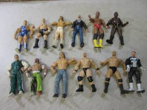 lot 300 image: (F-0) Lot of 12 Wrestling Action Fi...
