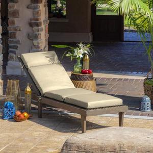 lot 140 image: 21 x 72 New Tan Leala Texture Outdoor Chaise Lounge Cushion by Arden Selections Its RETAIL PRICE IS $39.44