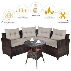 lot 11 image: 4-Pieces Rattan Patio Furniture Set Outdoor Sectional with Yellowish Cushioned Sofa Table The retail price $599.95