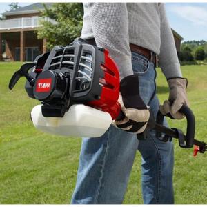 lot 42 image: 2-Cycle 25.4cc Attachment Capable Curved Shaft Gas String Trimmer The retail price $138.72