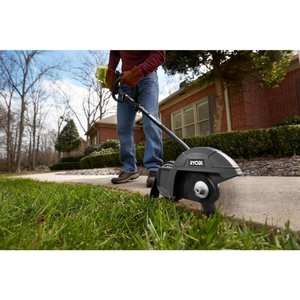 lot 74 image: Expand-It Edger, Hedge Trimmer, Blower, Pruner and Cultivator Attachment Kit The retail price $408.00