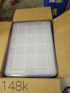 lot 148 image: WEATHERTIGHT 26.5 Qt. Multi-Purpose Storage Box in Clear with Blue Buckle (4-Pack) The retail price $59.73