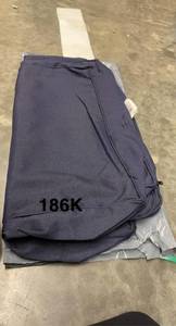 lot 186 image: Universal CushionGuard Midnight Deep Seat Slipcover Set by Hampton Bay Its RETAIL PRICE is $129.00