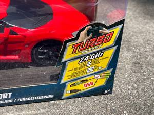 lot 38 image: Fast and Furious Lykan  Hyper Sport Remote Control Car (NIB)