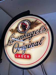 lot 64 image: Lighted Leinenkugels  Original Laager Wall Mount Lamp